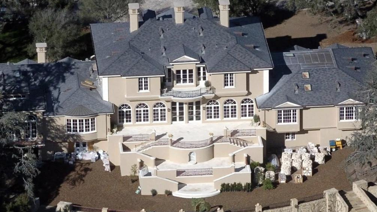 Oprah Winfrey's 42-acre Montecito estate in California features a tennis court, movie theatre, sprawling pool area, terraced gardens, and a 6,000-square-foot guest house.