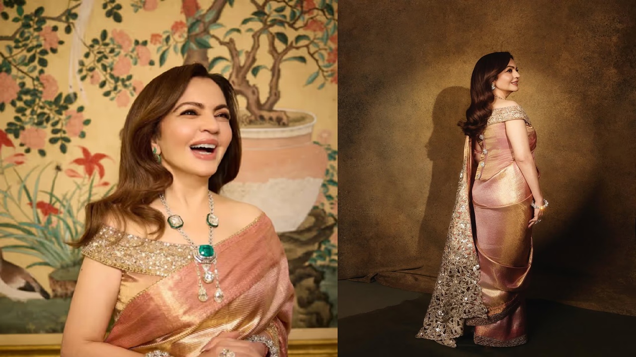 Nita Ambani was wearing a beautiful exquisite zari Kanjivaram saree with a zari cutwork pallu and a metallic sequin border. The zari antique embroidery on the off-shoulder corset that she wore with it.