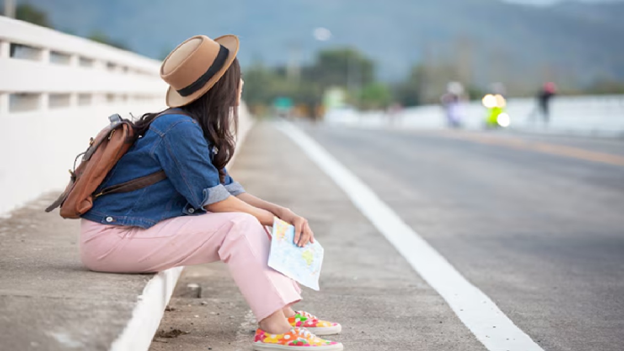 The phrase draws attention to the fact that one person has not yet traveled as far as others. It is a kind of comparison.