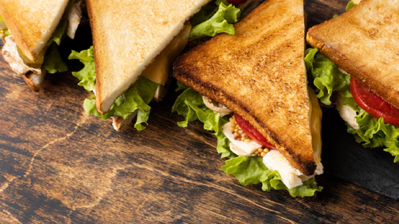 Grilled Cheese Sandwich: The traditional grilled cheese sandwich is made by buttering the exterior of thick slices of white or sourdough bread and stuffing it with your favorite cheese. Bake it until the bread is golden and crispy and the cheese is melted.