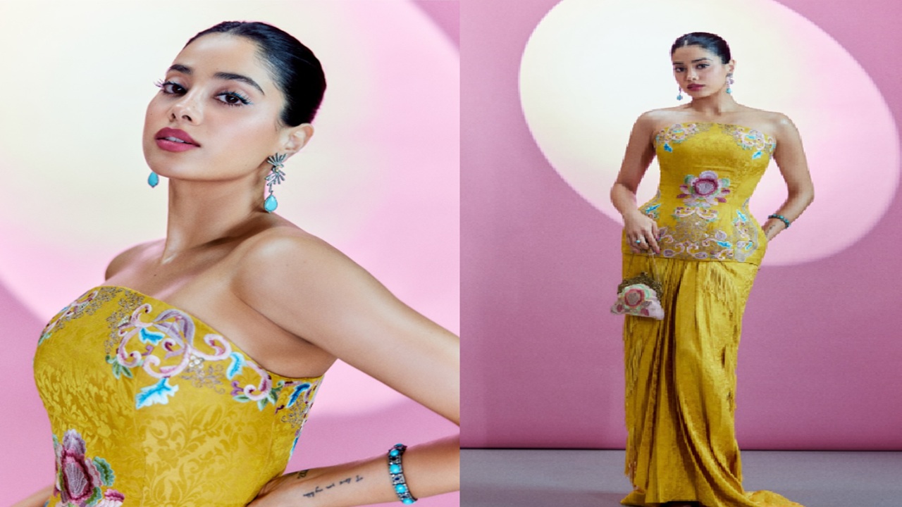 Janhvi was dressed in a strapless, lime green corset. It had needlework in contrasting tones of blue and touches of pink and purple floral design.