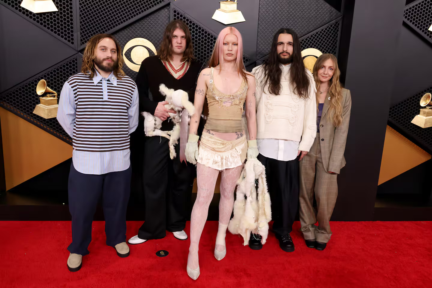 The British indie rock band carries a fluffy animal split in half.