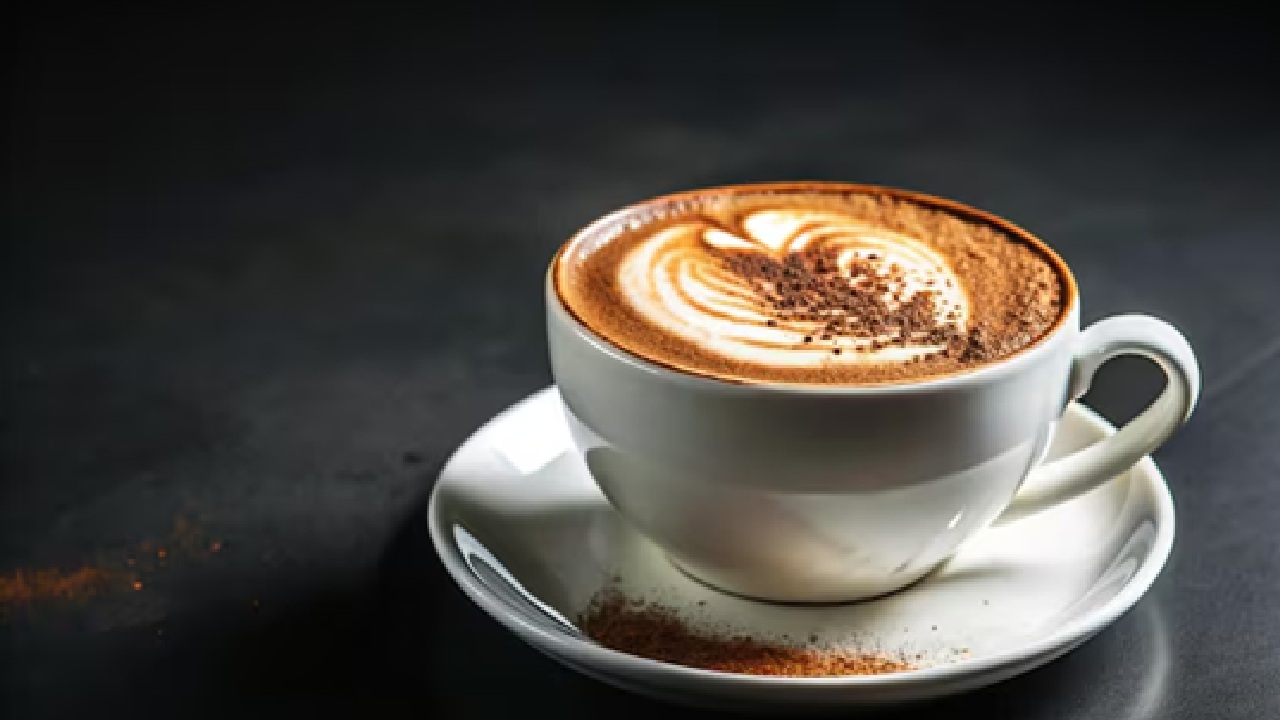 Steam is produced by hot coffee. This steam is released through the tiny, typically elevated hole, which keeps the cover from blowing off due to increasing pressure. (Disclaimer: Given the input is on an information basis, please seek professional advice.)