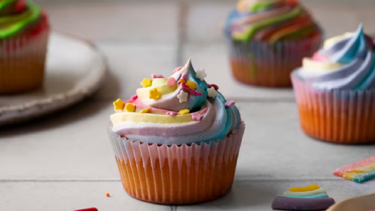For a more refined appearance, pipe a swirl of white or pink frosting on chocolate cupcakes, then gently sprinkle heart shaped sprinkles only around the bottom edge.
