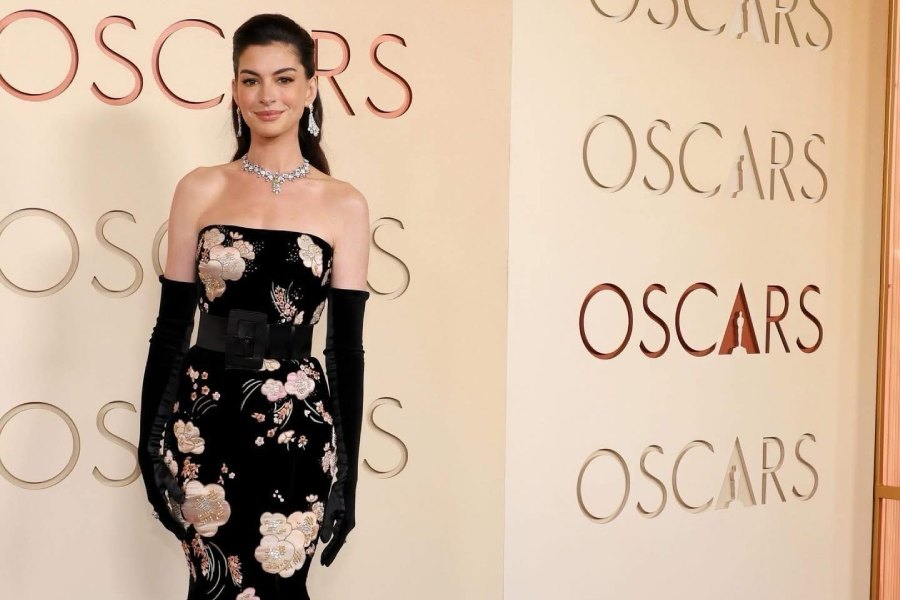 Anne Hathaway dropped everyone's jaws in an off-the-shoulder black dress embossed with floral motifs.