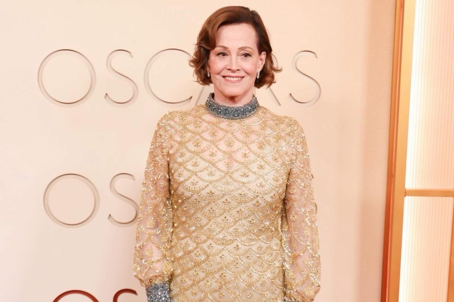 Exuding regal charm, Sigourney Weaver rocked the Oscars red carpet in a silver-and-gold sequinned embroidered gown with a high neckline.